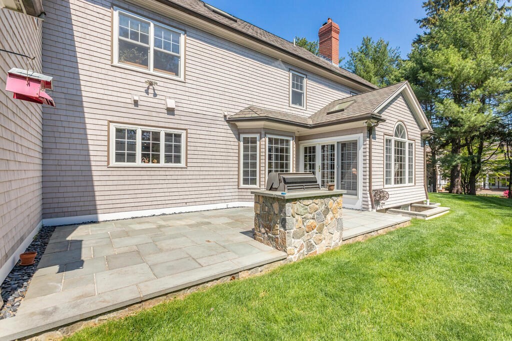 4 Hampton Road Lexington, MA 02421 - Photo 30 of 30 a view of house with a backyard and a patio