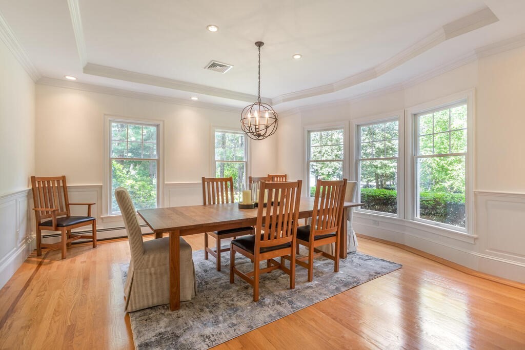 4 Hampton Road Lexington, MA 02421 - Photo 7 of 30 a view of a dining room with furniture window and wooden floor
