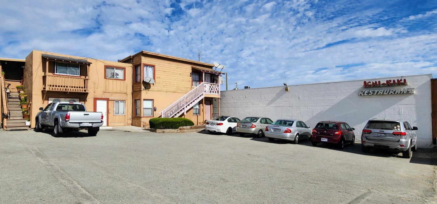 1591 Del Monte Boulevard Seaside, CA 93955 - Photo 1 of 20 a car parked in front of a building