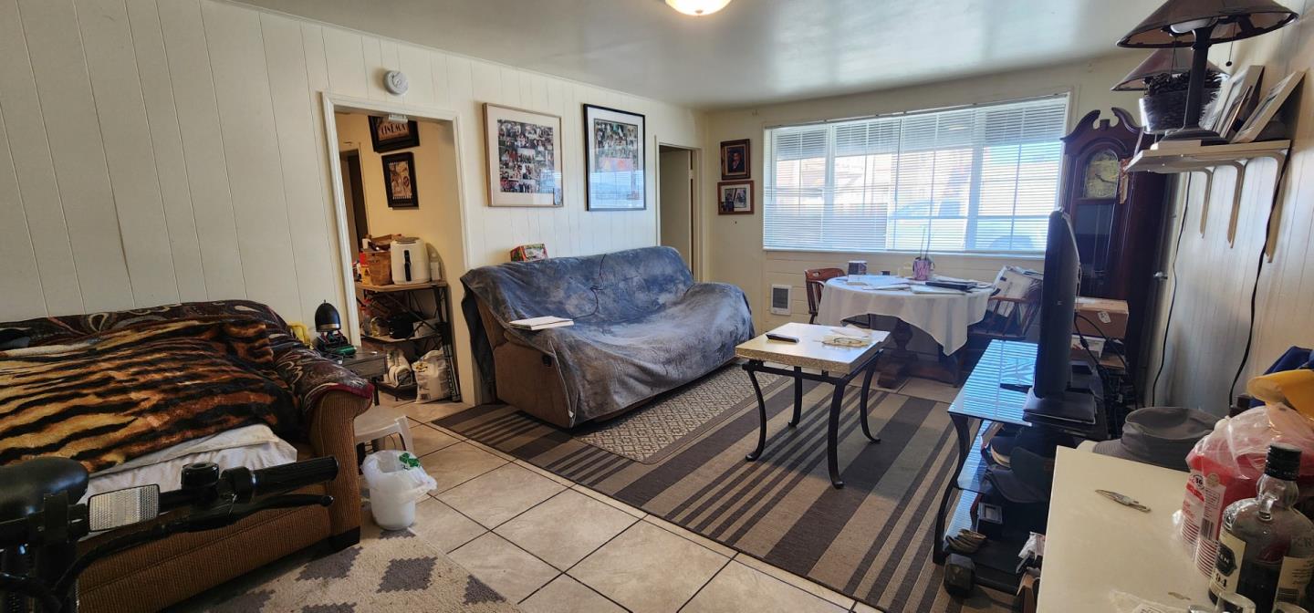 1591 Del Monte Boulevard Seaside, CA 93955 - Photo 14 of 20 a living room with furniture a window and a flat screen tv