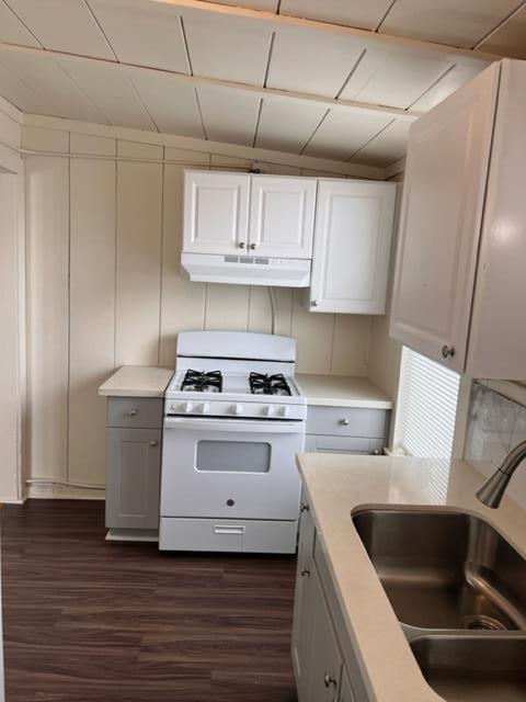 1591 Del Monte Boulevard Seaside, CA 93955 - Photo 18 of 20 a kitchen with a stove and white cabinets