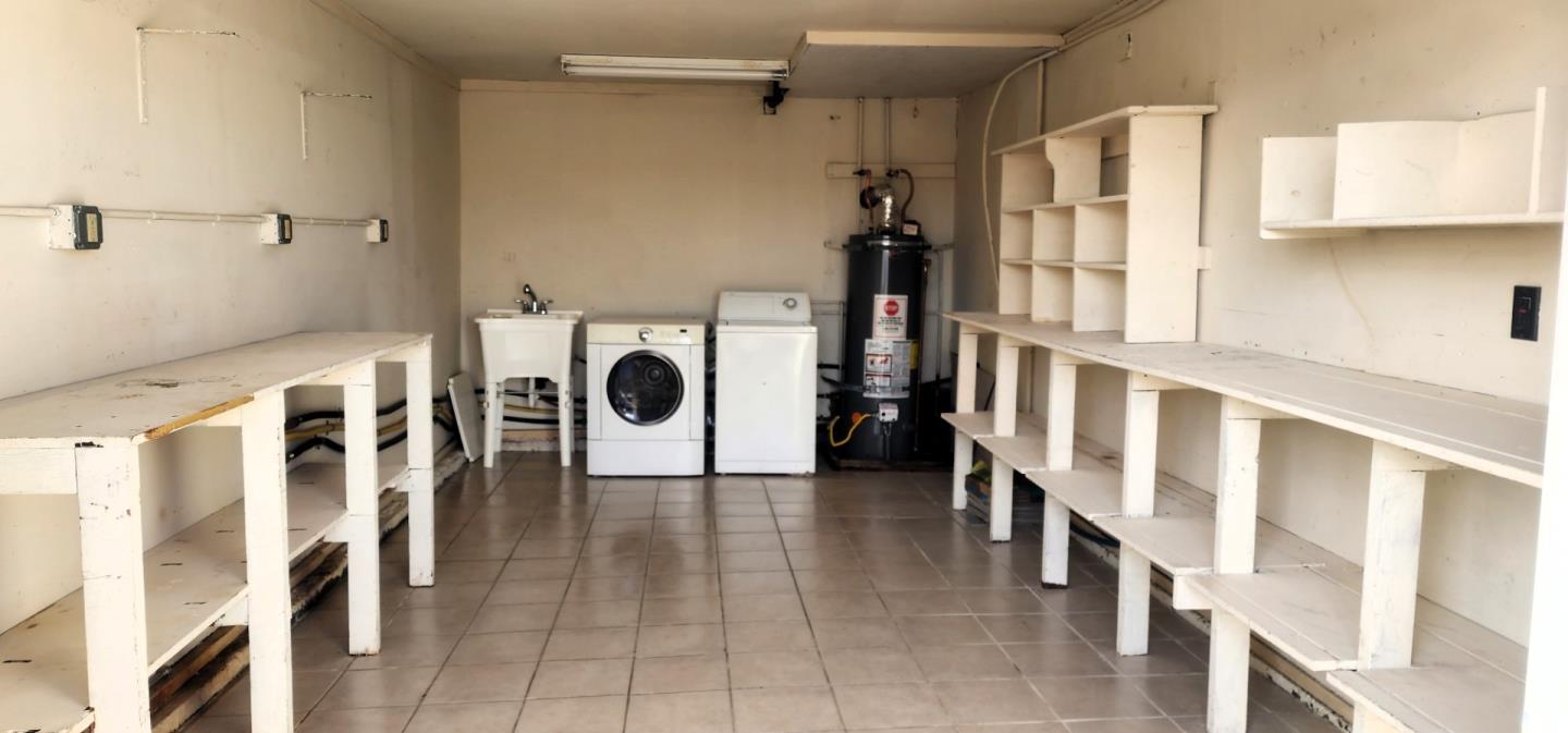 1591 Del Monte Boulevard Seaside, CA 93955 - Photo 5 of 20 a view of a hallway with a kitchen