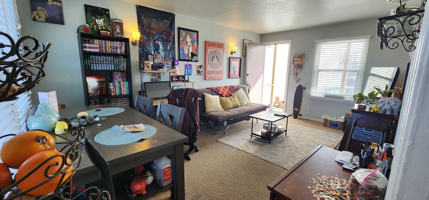 1591 Del Monte Boulevard Seaside, CA 93955 - Photo 7 of 20 a living room with furniture and a window