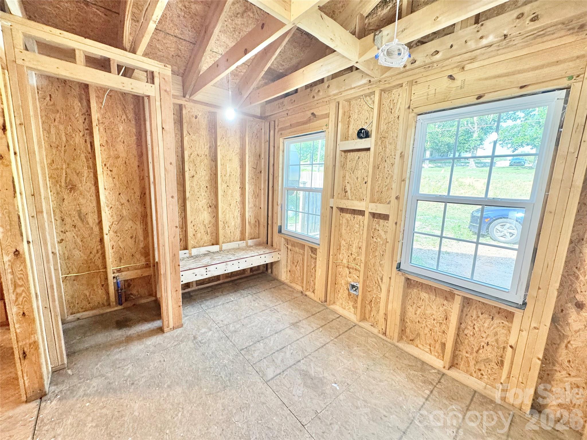 714 Dudley Shoals Road Granite Falls, NC 28630 - Photo 5 of 15 a view of an empty room with a window