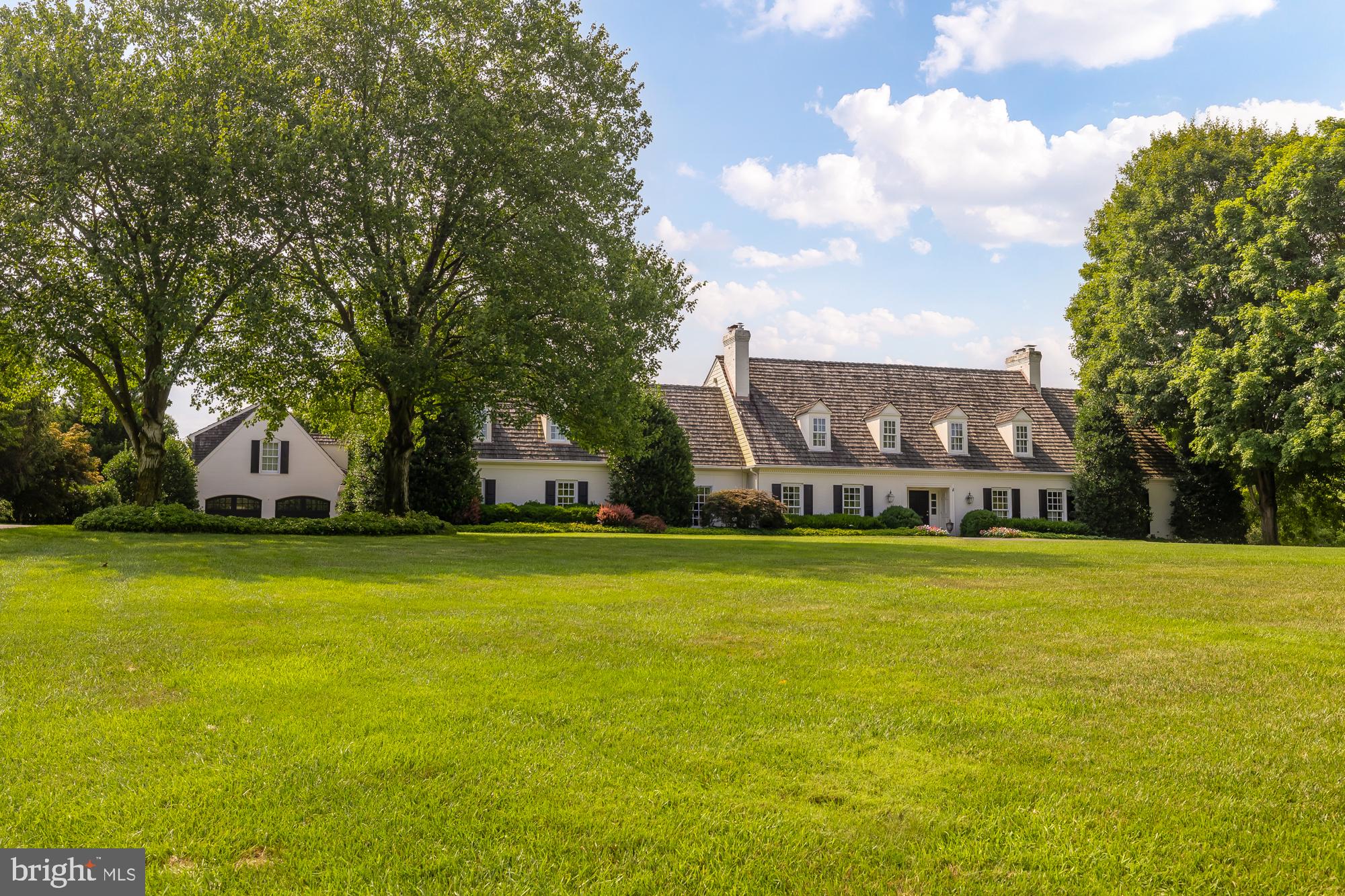 11101 Piney Meetinghouse Road Potomac, MD 20854 - Photo 1 of 96 Charming estate with lush greenery.