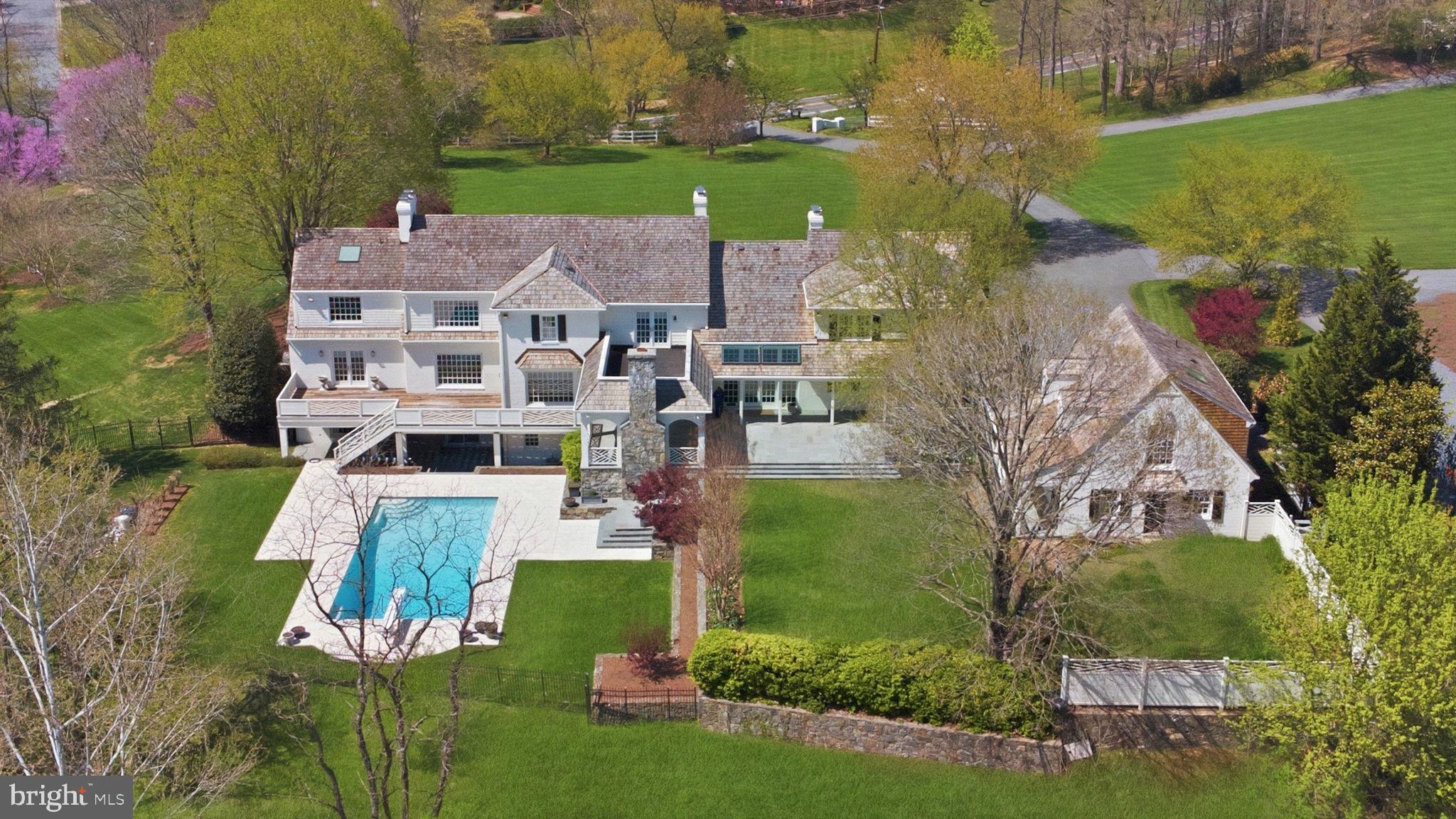 11101 Piney Meetinghouse Road Potomac, MD 20854 - Photo 2 of 96 Elegant estate with serene poolside.