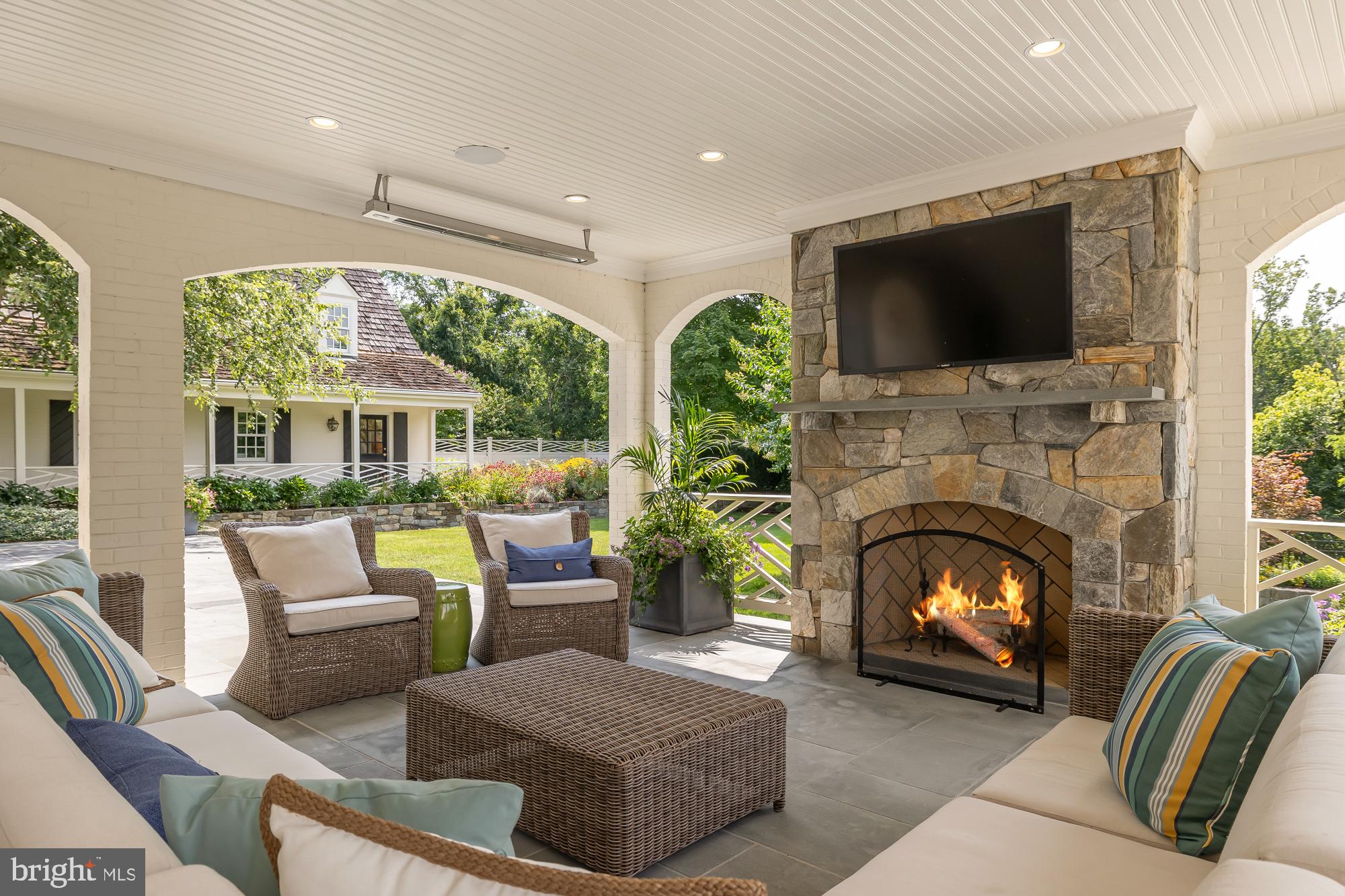11101 Piney Meetinghouse Road Potomac, MD 20854 - Photo 27 of 96 Cozy outdoor retreat with fireplace.