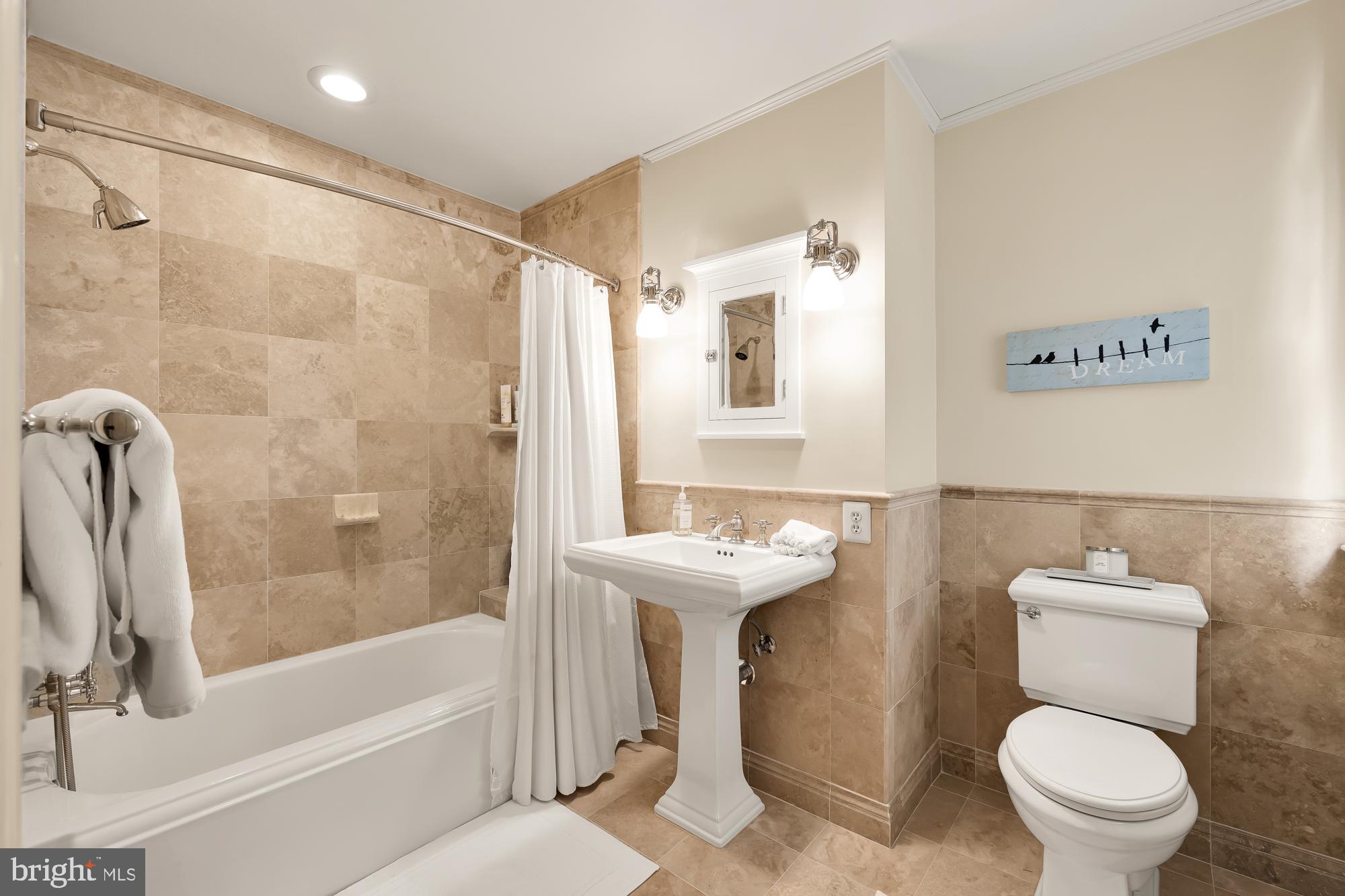 11101 Piney Meetinghouse Road Potomac, MD 20854 - Photo 48 of 96 Elegant bathroom with serene tones.