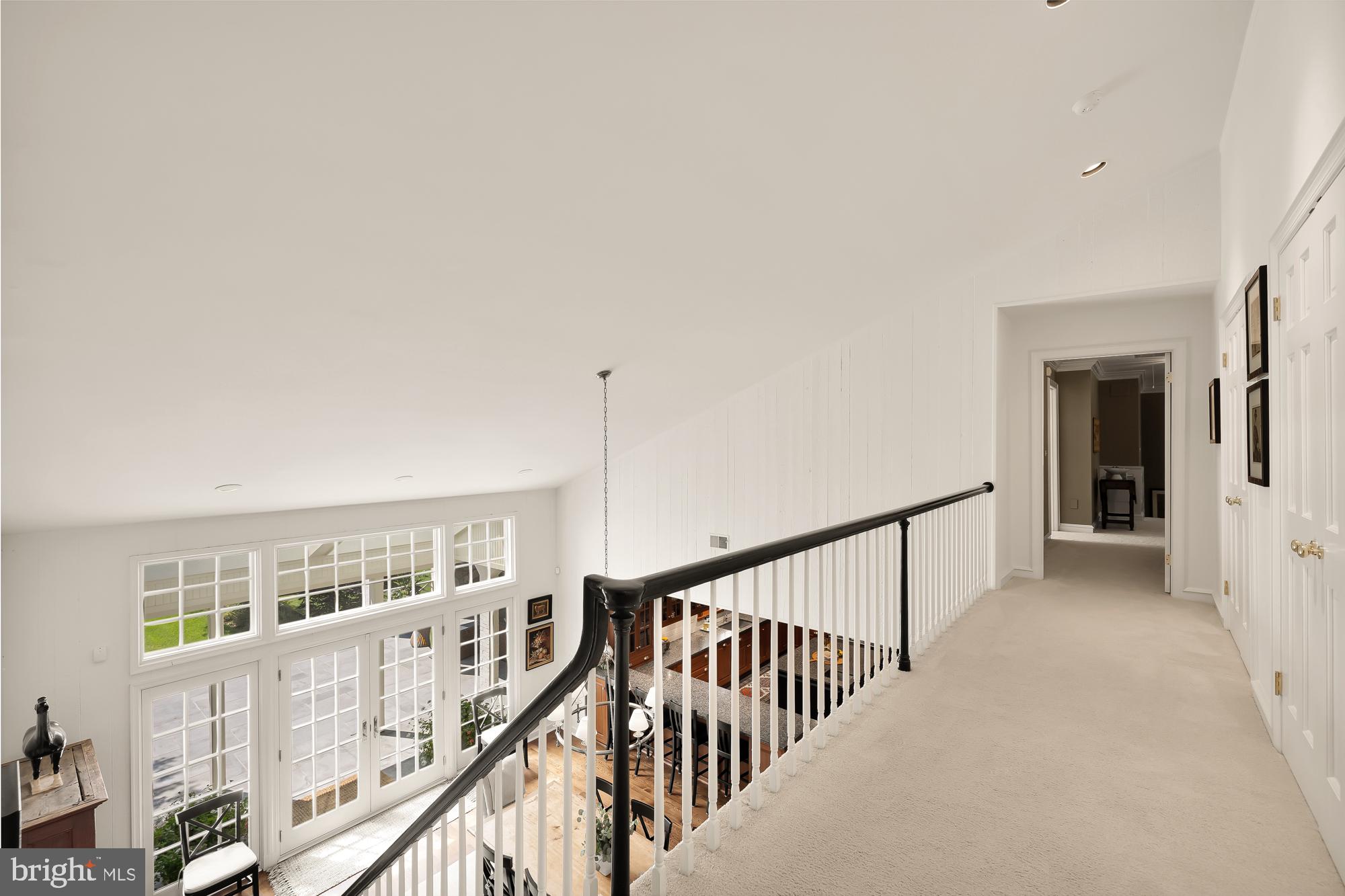 11101 Piney Meetinghouse Road Potomac, MD 20854 - Photo 50 of 96 Bright and airy second-floor landing.