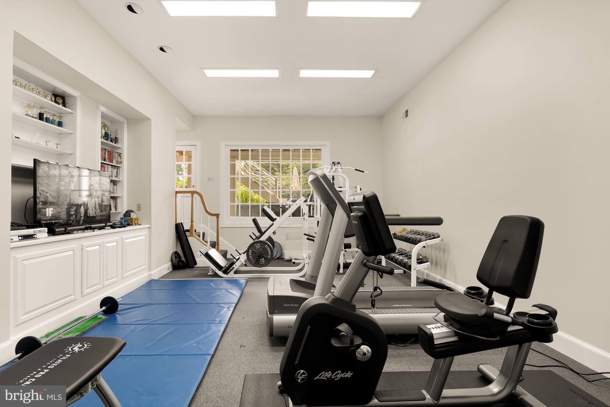 11101 Piney Meetinghouse Road Potomac, MD 20854 - Photo 60 of 96 Bright and airy home gym oasis.