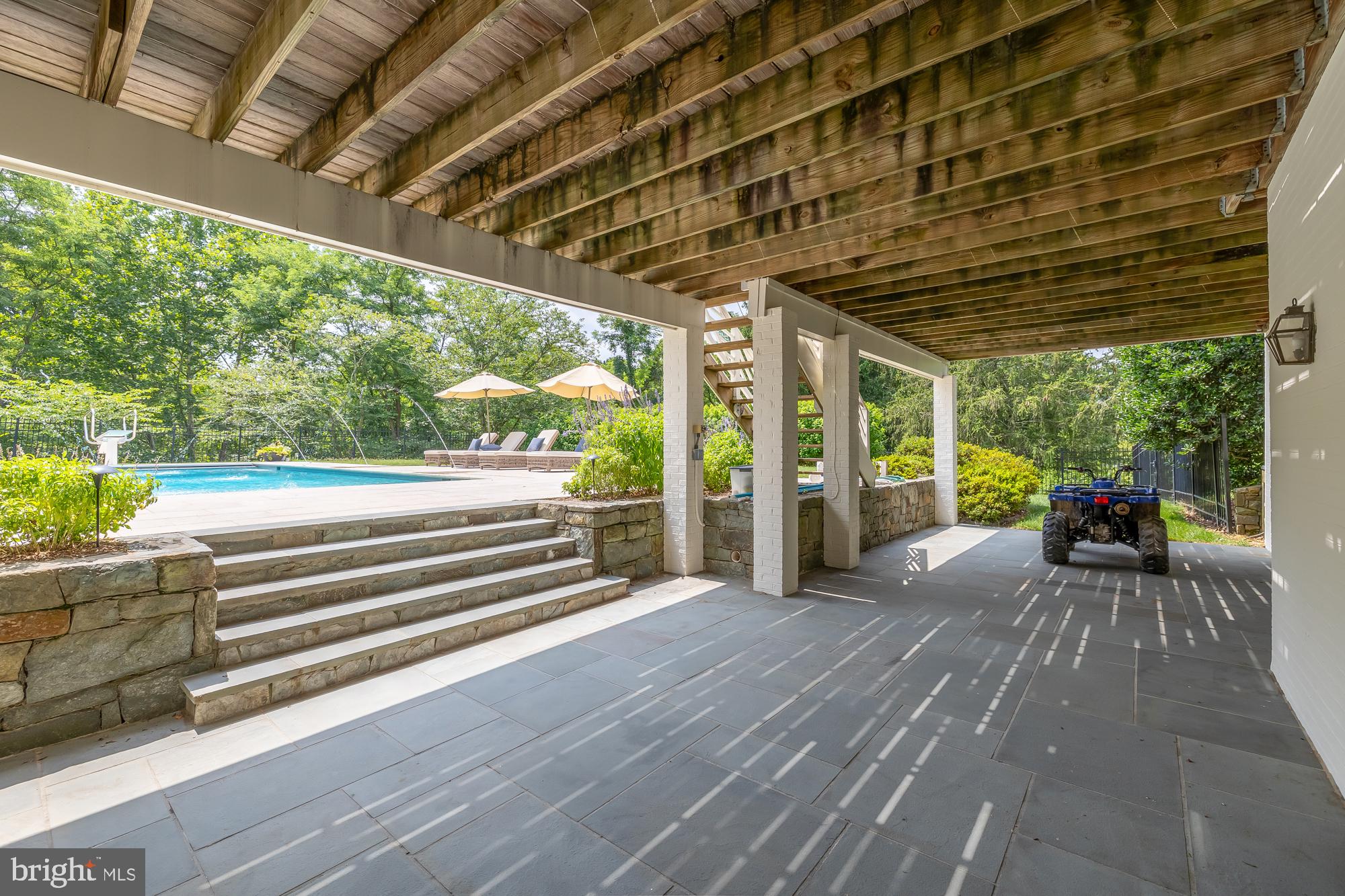 11101 Piney Meetinghouse Road Potomac, MD 20854 - Photo 61 of 96 Serene outdoor retreat with poolside charm.