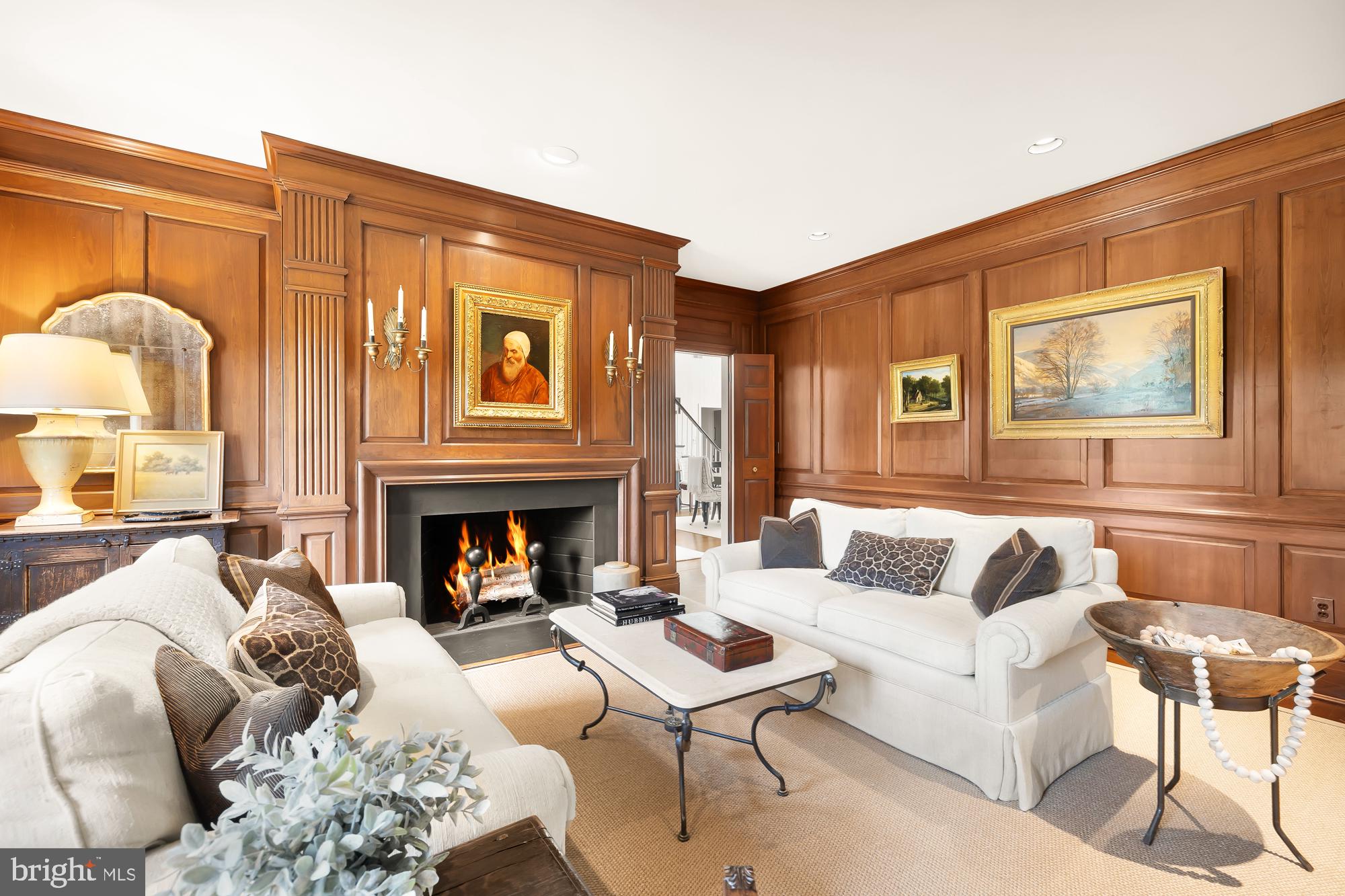 11101 Piney Meetinghouse Road Potomac, MD 20854 - Photo 7 of 96 Elegant living room with rich wood accents.