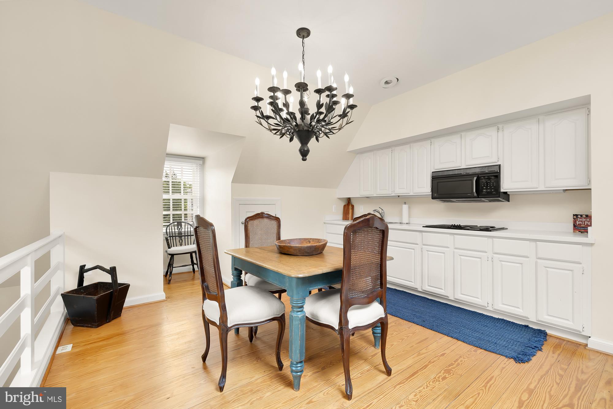 11101 Piney Meetinghouse Road Potomac, MD 20854 - Photo 78 of 96 Charming kitchen with elegant chandelier.