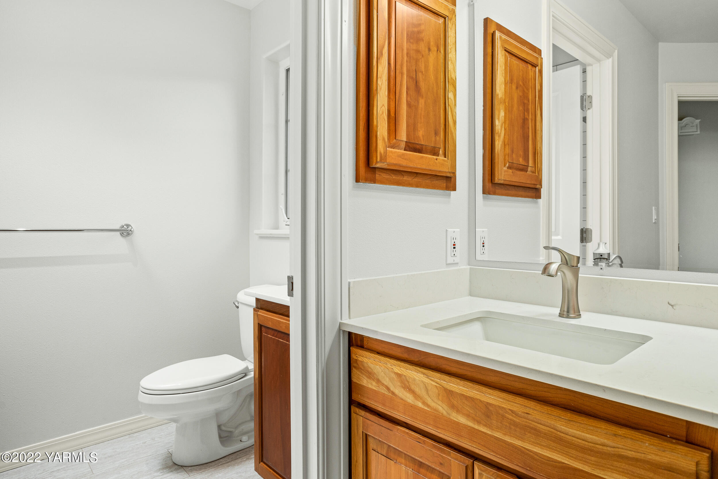 805 South Hennessy Road Yakima, WA 98908 - Photo 15 of 26 a bathroom with a sink a toilet and shower