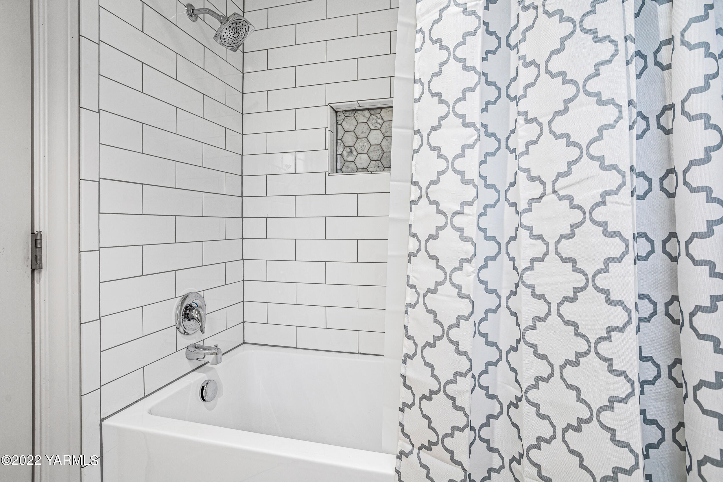 805 South Hennessy Road Yakima, WA 98908 - Photo 16 of 26 a white bath tub sitting next to a white wall