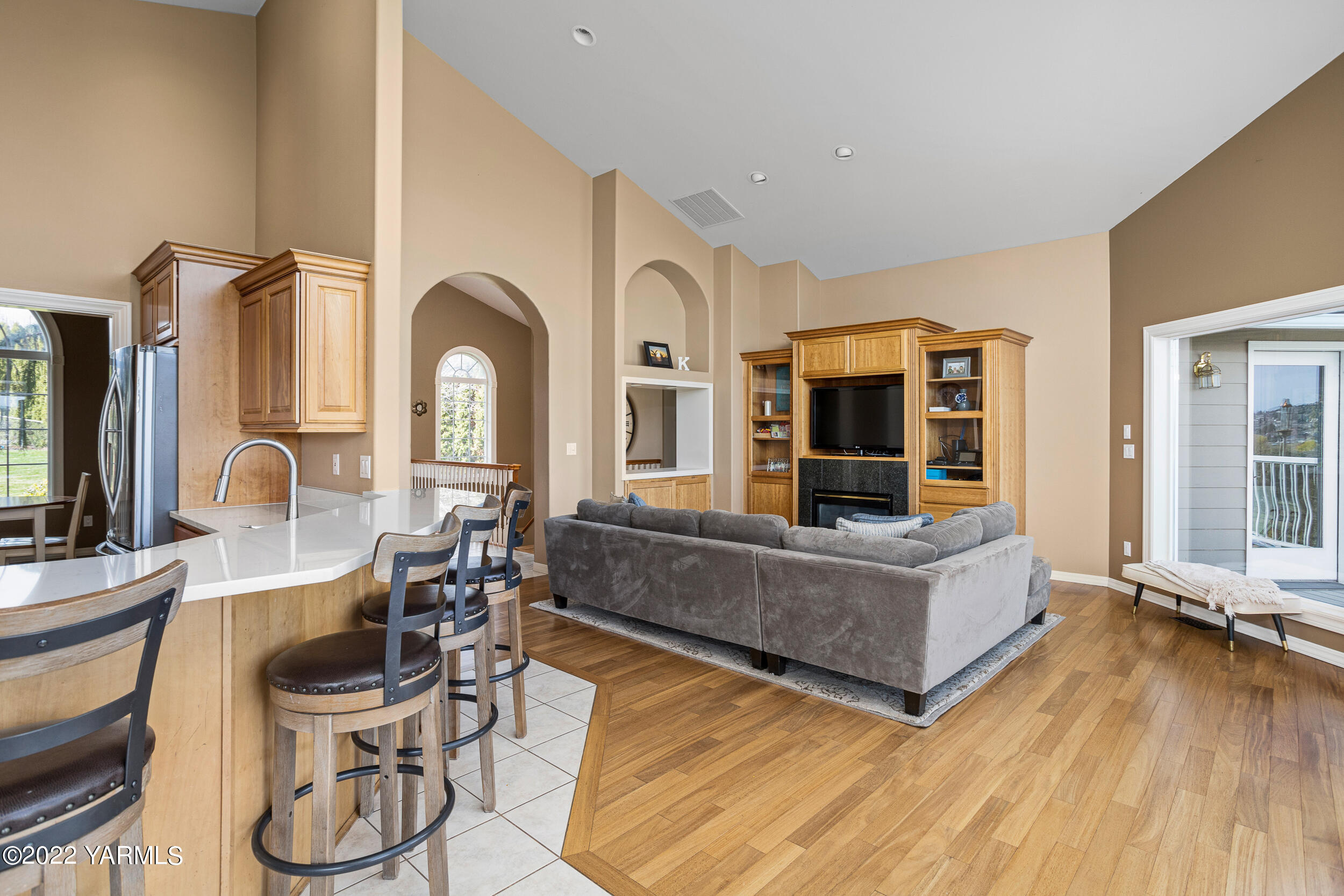 805 South Hennessy Road Yakima, WA 98908 - Photo 5 of 26 a living room with furniture and a flat screen tv