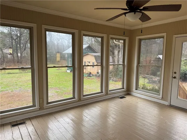 a view of a room with racks on the wall