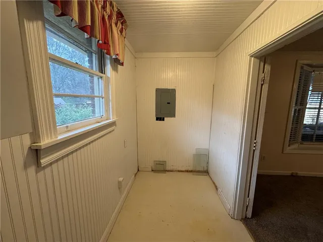 a view of an empty room and window