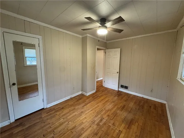 a view of a bathroom from a hallway