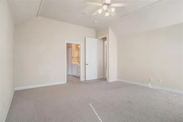 an empty room with a bathroom