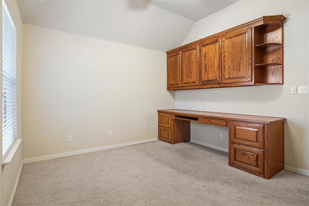 756 Trails End Circle Hurst, TX 76054 - Photo 21 of 26 a room with a bench