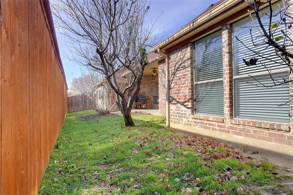756 Trails End Circle Hurst, TX 76054 - Photo 26 of 26 a view of a house with a yard