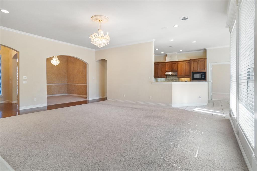 756 Trails End Circle Hurst, TX 76054 - Photo 6 of 26 a view of a livingroom with a chandelier
