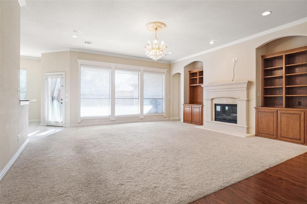 756 Trails End Circle Hurst, TX 76054 - Photo 8 of 26 a big room with windows and fireplace