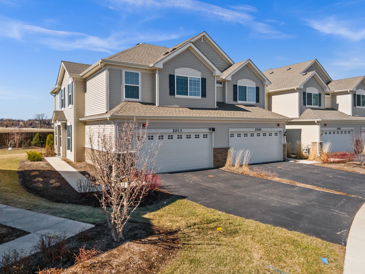 2013 Stuttle Road Batavia, IL 60510 - Photo 1 of 1 a front view of a house with a yard and garage