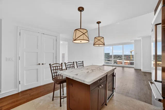 a view of a dining table and chairs