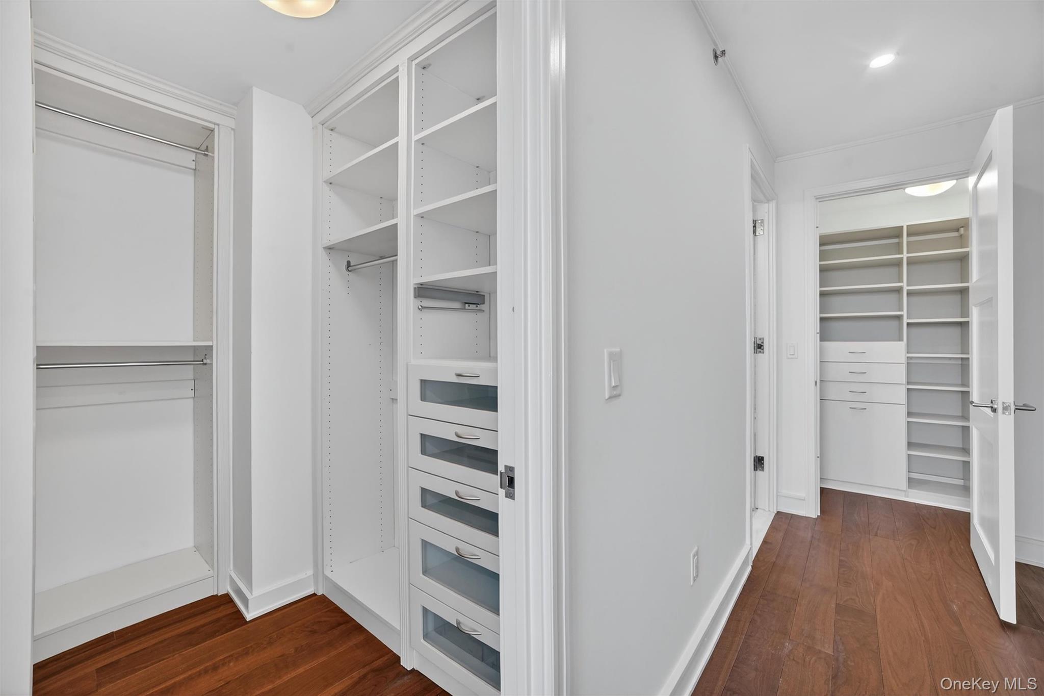 1 Renaissance Square, Unit 26F White Plains, NY 10601 - Photo 24 of 33 a view of closet area with empty racks