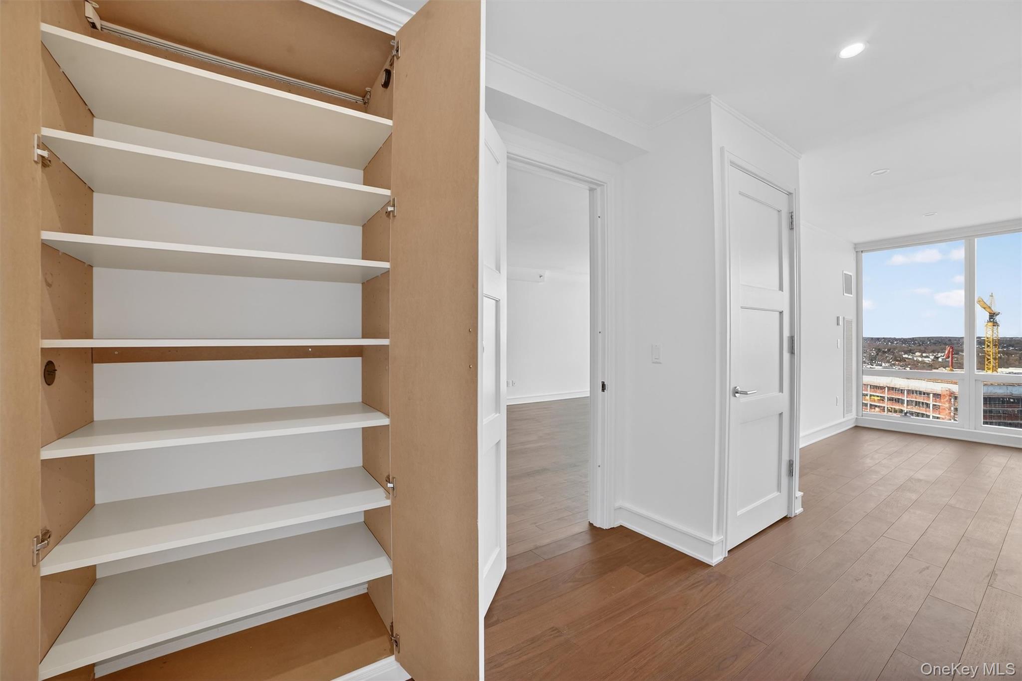 1 Renaissance Square, Unit 26F White Plains, NY 10601 - Photo 25 of 33 a view of entryway and hall with wooden floor