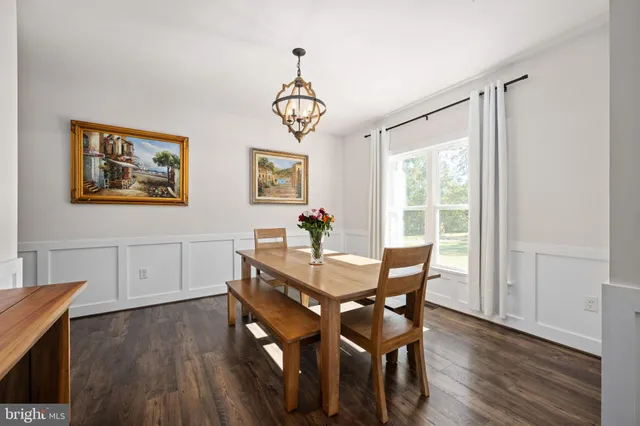 a kitchen with a sink stainless steel appliances and cabinets