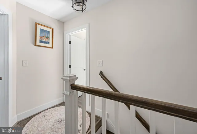 a view of a house with a yard in front of it