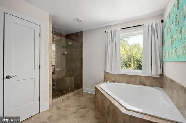 an aerial view of residential house with outdoor space