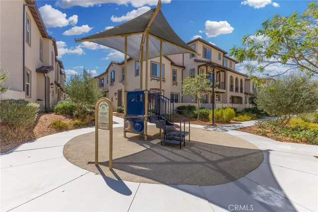 a view of a street with a houses
