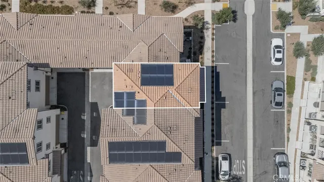 a view of a street with a building in the background