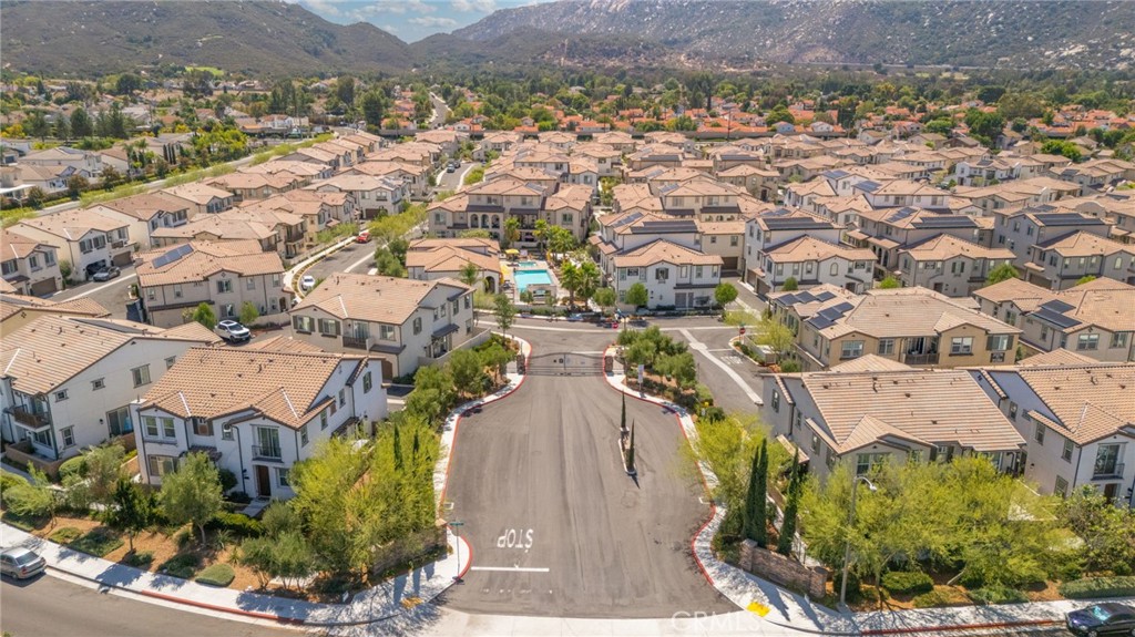 45763 Via Nubes Temecula, CA 92592 - Photo 49 of 63 an aerial view of residential houses with outdoor space