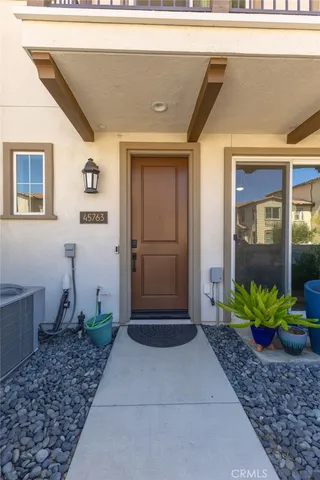a view of a entryway door front of house