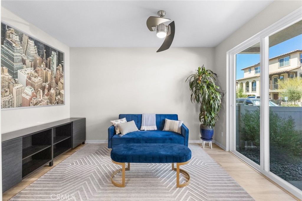 45763 Via Nubes Temecula, CA 92592 - Photo 10 of 63 a living room with furniture and a rug