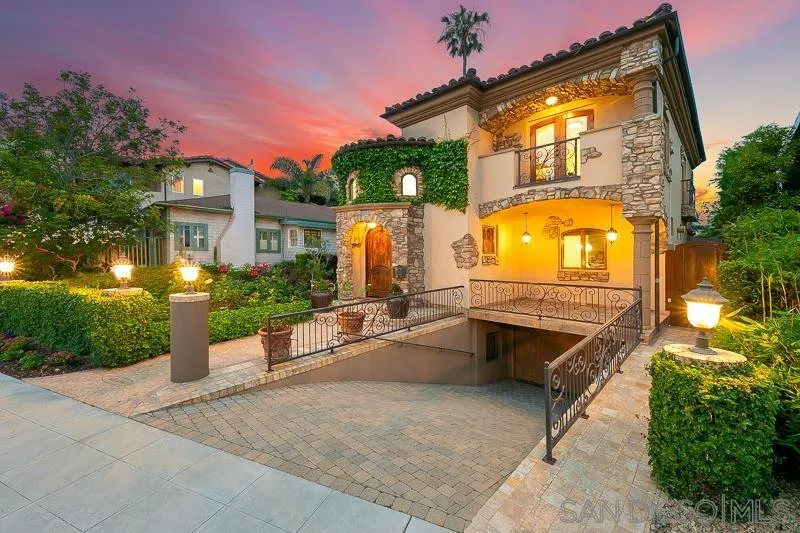 a front view of a house with a swimming pool