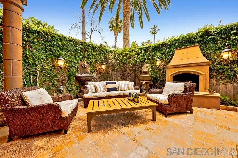7964 Prospect Place La Jolla, CA 92037 - Photo 17 of 46 a view of a patio with couches and a fire pit