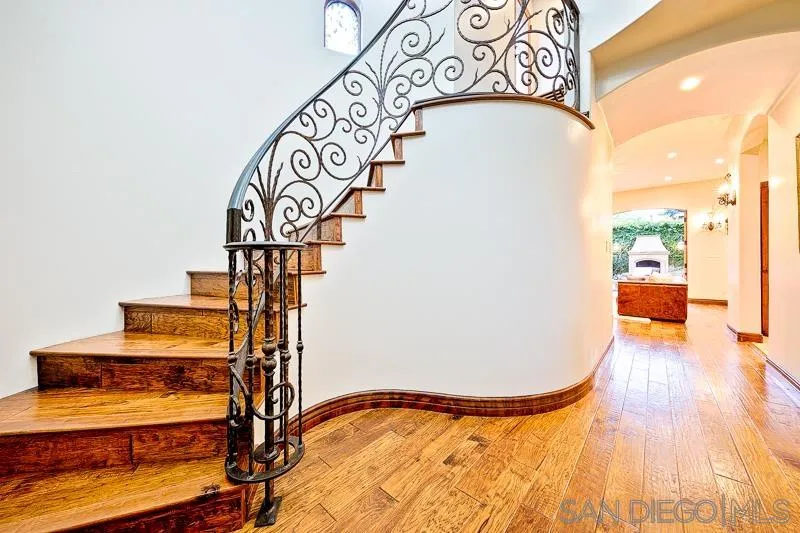 7964 Prospect Place La Jolla, CA 92037 - Photo 2 of 46 a view of an entryway with wooden floor