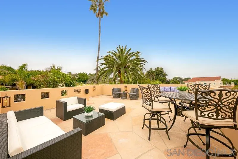 7964 Prospect Place La Jolla, CA 92037 - Photo 42 of 46 a view of a terrace with furniture and a table