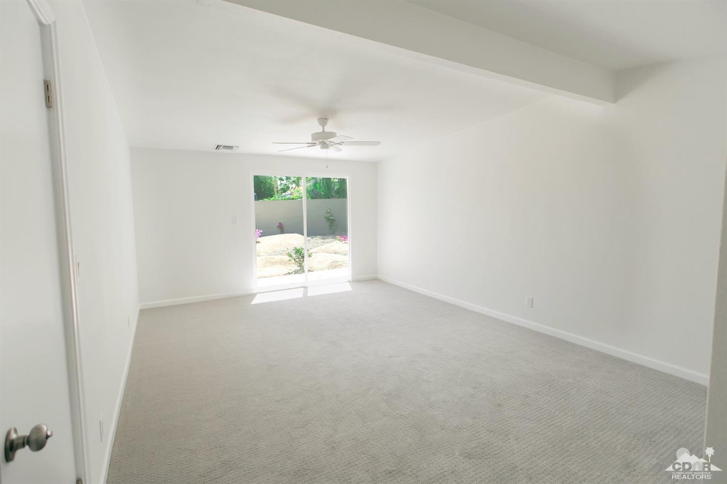 71933 Vista Del Rio Rancho Mirage, CA 92270 - Photo 14 of 32 a view of an empty room with a window