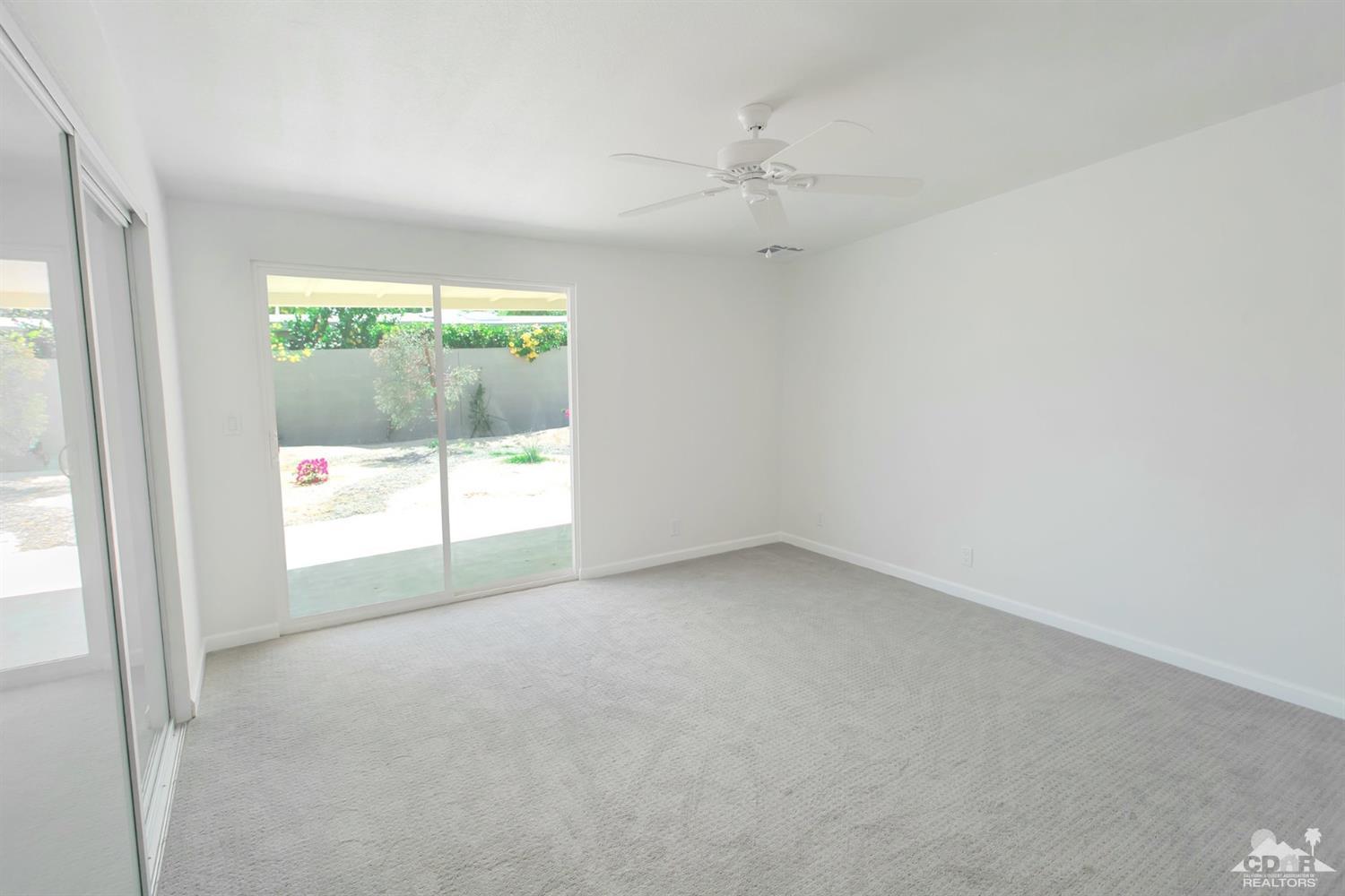 71933 Vista Del Rio Rancho Mirage, CA 92270 - Photo 24 of 32 an empty room with a window
