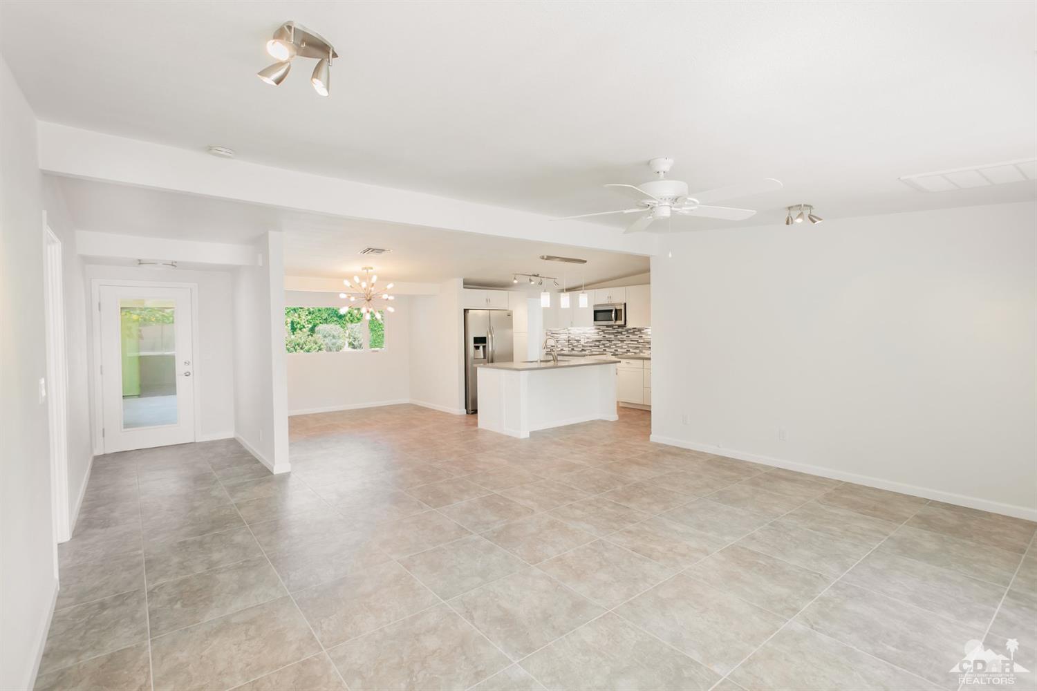 71933 Vista Del Rio Rancho Mirage, CA 92270 - Photo 28 of 32 wooden floor in an empty room