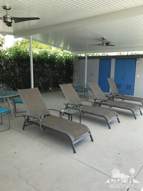 71933 Vista Del Rio Rancho Mirage, CA 92270 - Photo 31 of 32 a view of a patio with table and chairs