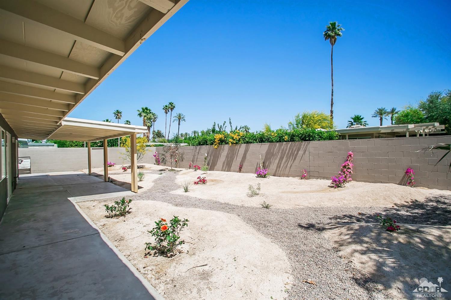 71933 Vista Del Rio Rancho Mirage, CA 92270 - Photo 8 of 32 an outdoor space with furniture