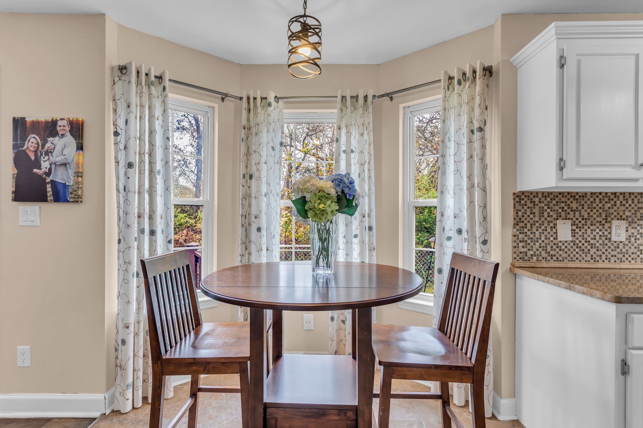 116 Jackson Street Mount Pleasant, TN 38474 - Photo 13 of 27 a view of a dining room with furniture window and wooden floor